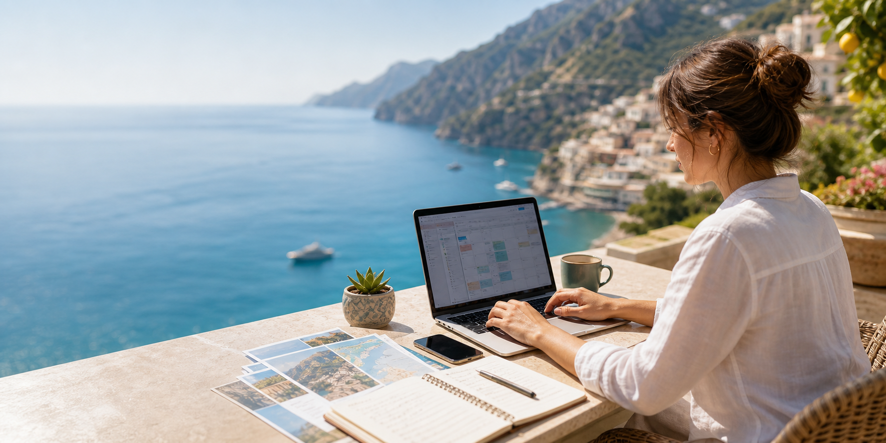 Travel professional working on itinerary planning beside a coastal view